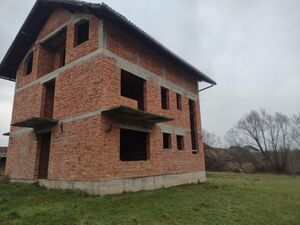 Huge house, quality brickwork, surrounded by meadows 