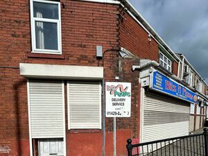 House with Two Flat and One Commercial Store