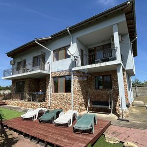 Two-story house with a well and a sea view by the sea