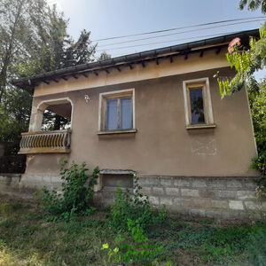 Old rural house with annex, small barn and land in a village